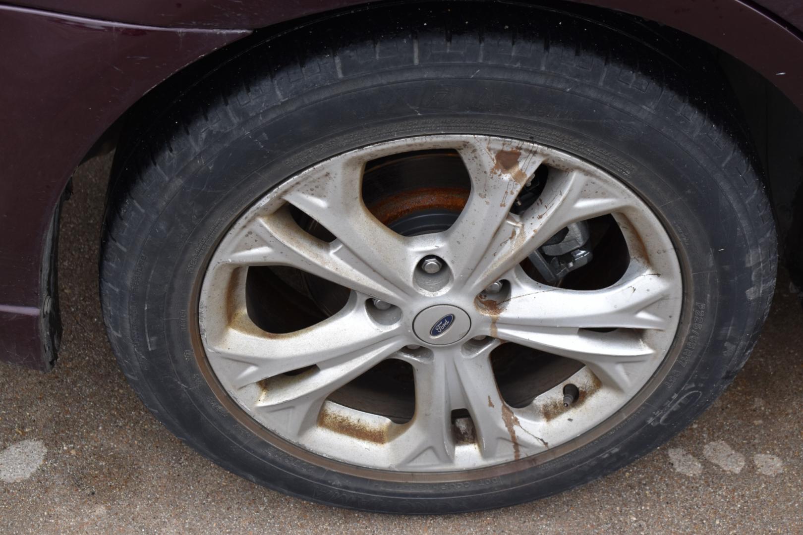 2012 Red /Gray Ford Fusion SE (3FAHP0HA0CR) with an 2.5L L4 DOHC 16V engine, 6 Speed AUTOMATIC transmission, located at 5925 E. BELKNAP ST., HALTOM CITY, TX, 76117, (817) 834-4222, 32.803799, -97.259003 - Photo#24